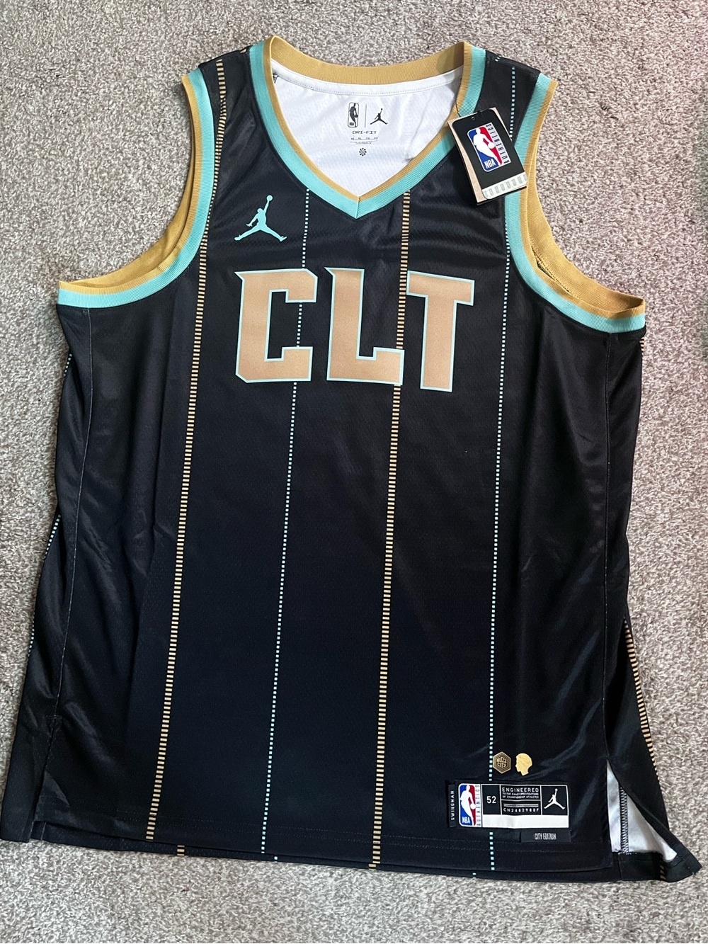 Nike CLT Basketball Jersey in Black, Gold & Aqua